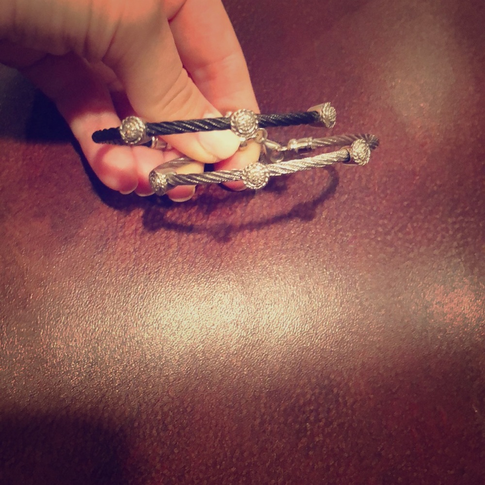 One black and one silver Charriol cable bangle